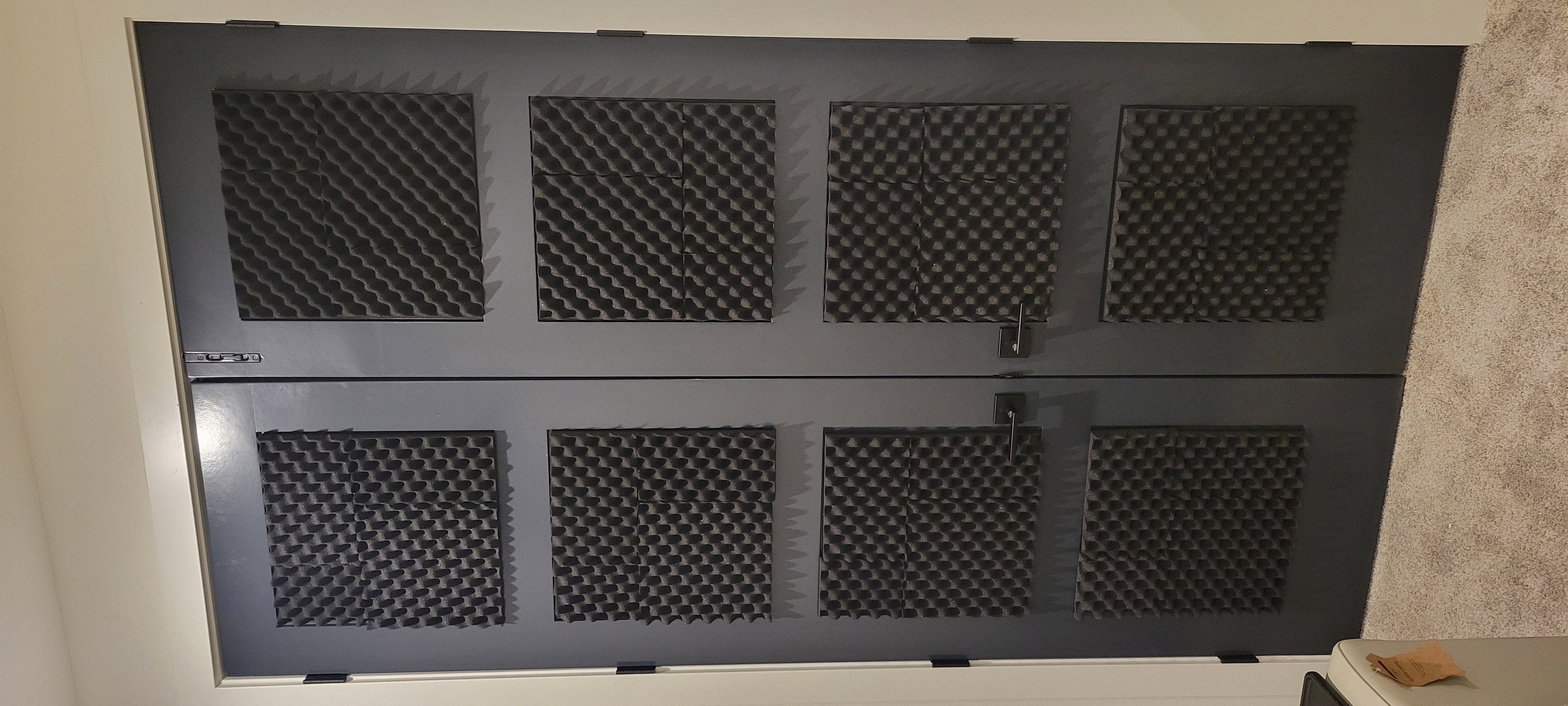 Theater doors with acoustic foam