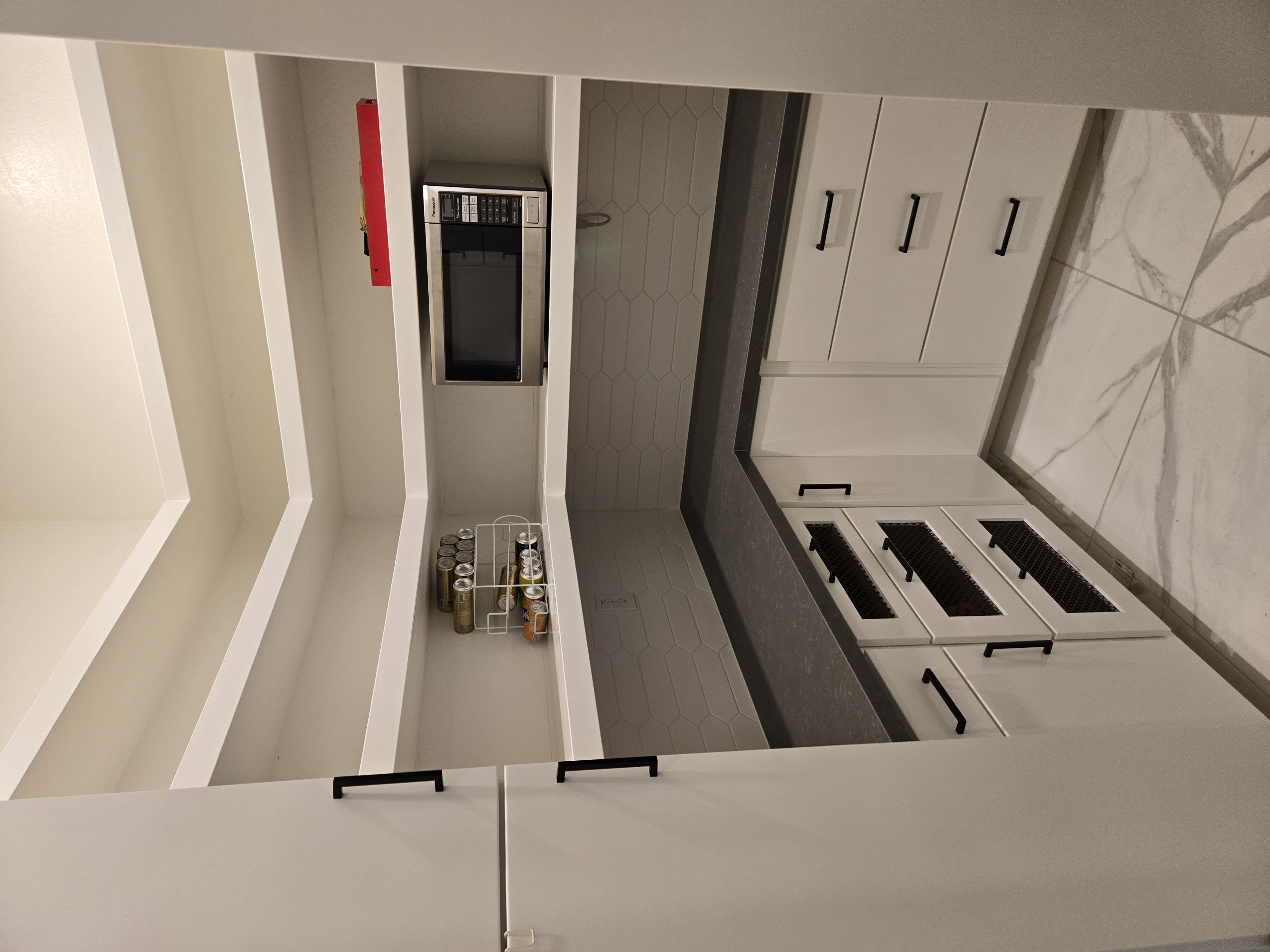 Custom pantry with mesh drawers